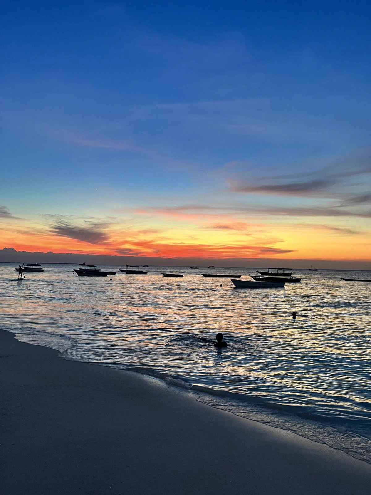 An evening swim at sunset on Nungwi beach